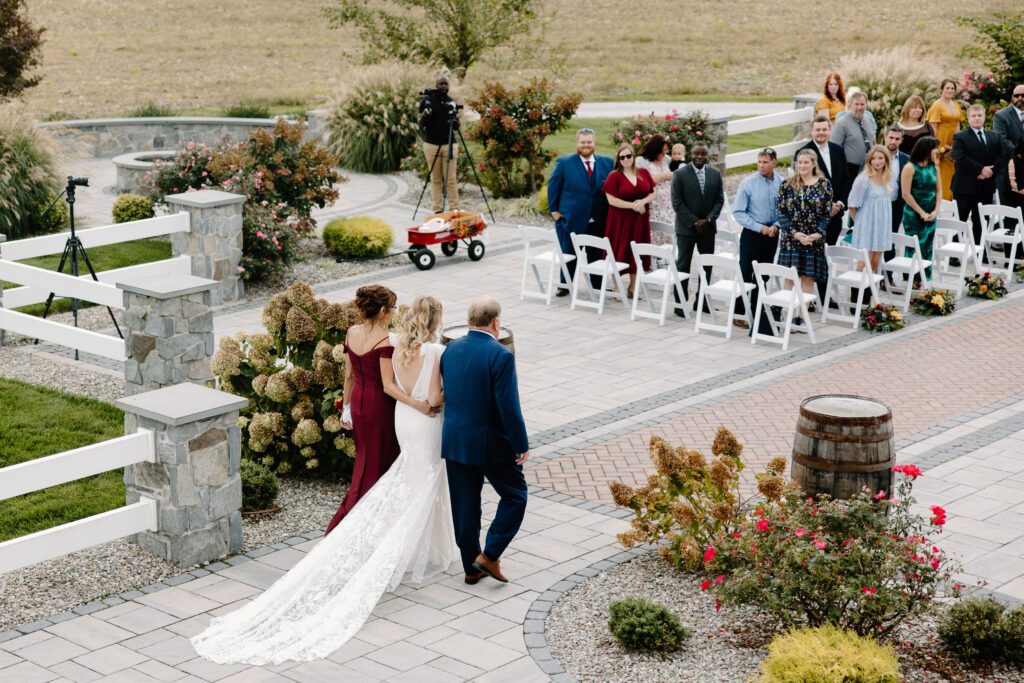 bride walking down the aisle for fall wedding