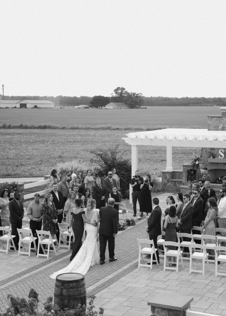 bride walking down the aisle for fall wedding