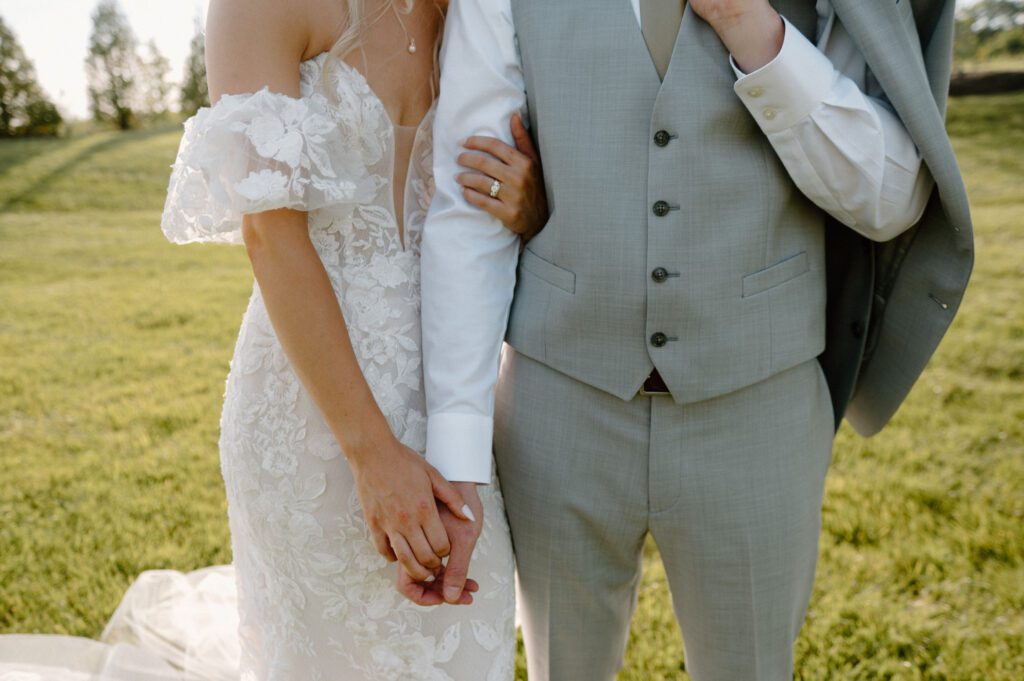 romantic bride and groom photos at terrain gardens for a garden wedding in the summer