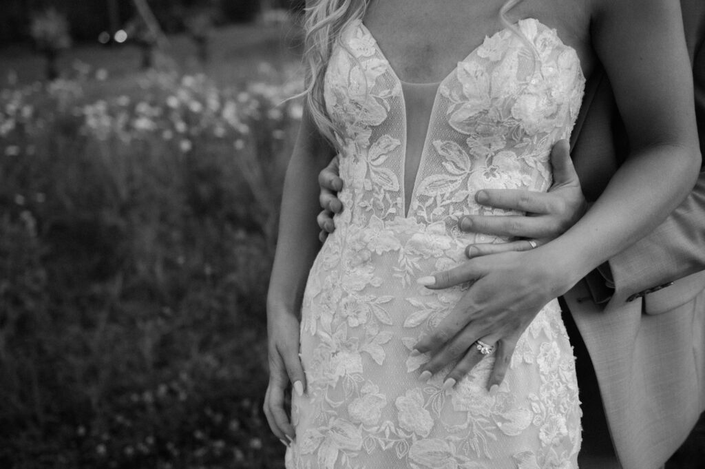 romantic bride and groom photos at terrain gardens for a garden wedding in the summer