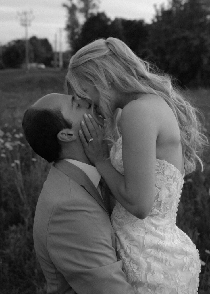 romantic bride and groom photos at terrain gardens for a garden wedding in the summer