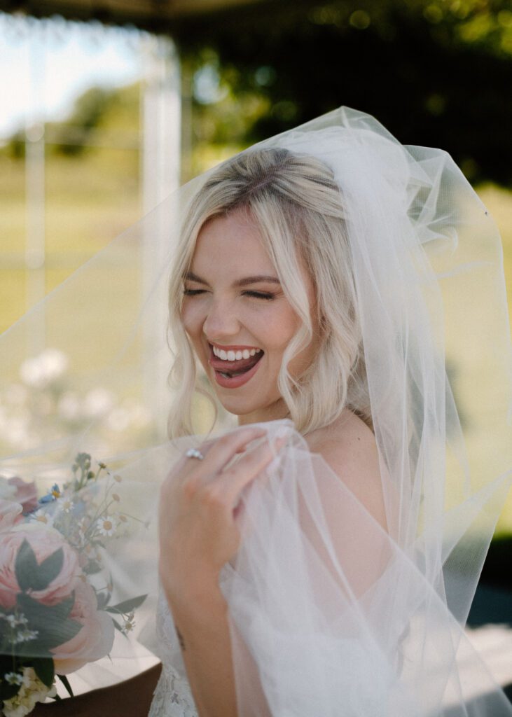 colorful and bright bride and groom photos with summer florals