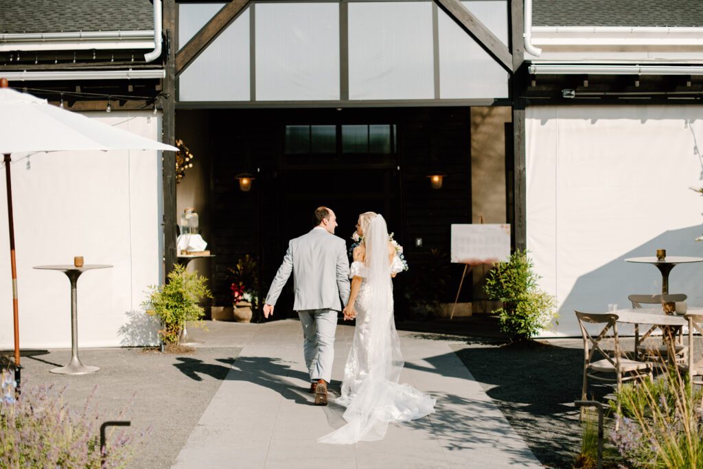 bride and groom walking away after wedding ceremony