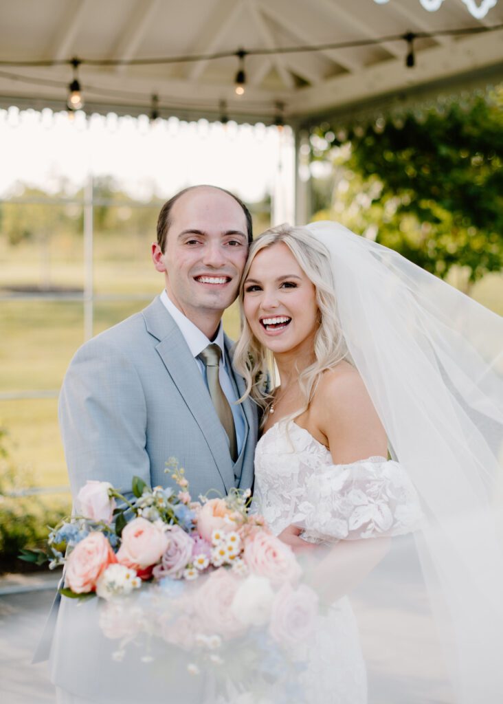 colorful and bright bride and groom photos with summer florals