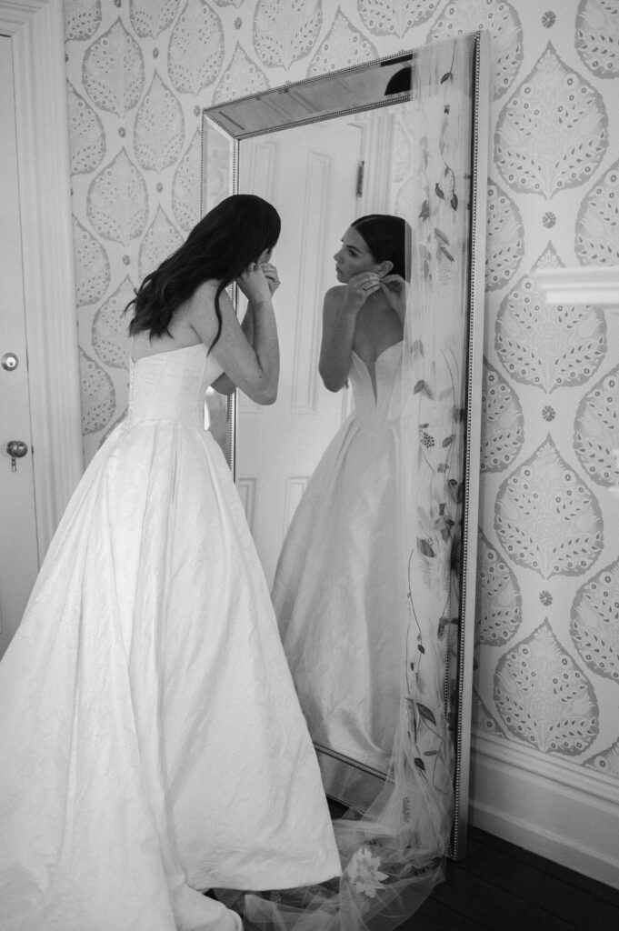 bride final touches getting ready wedding photos